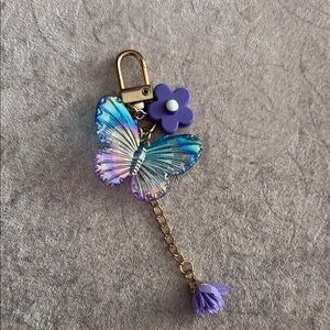 Iridescent Butterfly Keychain with Purple Flower Charm